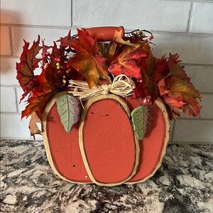 Festive Wood Pumpkin Decor with Autumn Leaves